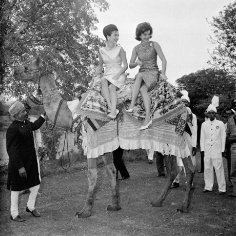 karachi-1962-jacqueline-kennedy-perches-on-camel-in-karachi-while-on-a-goodwill-visit-to-india-and-pakistan.jpg