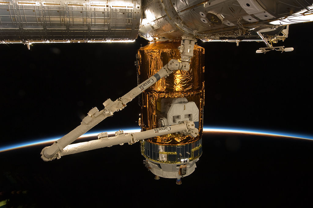 1024px-ISS-26_HTV-2_Exposed_Pallet_grappled_by_Canadarm2.jpg