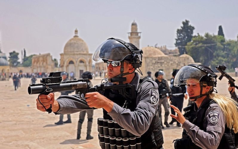 Israeli security forces and Palestinian Muslim worshippers clash in Jerusalem's Al  Aqsa mosque compound, the third holiest site of Islam, on May 21, 2021. — AFP