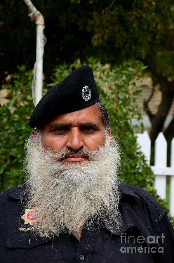 portrait-of-pakistani-security-guard-with-flowing-white-beard-karachi-pakistan-imran-ahmed.jpg