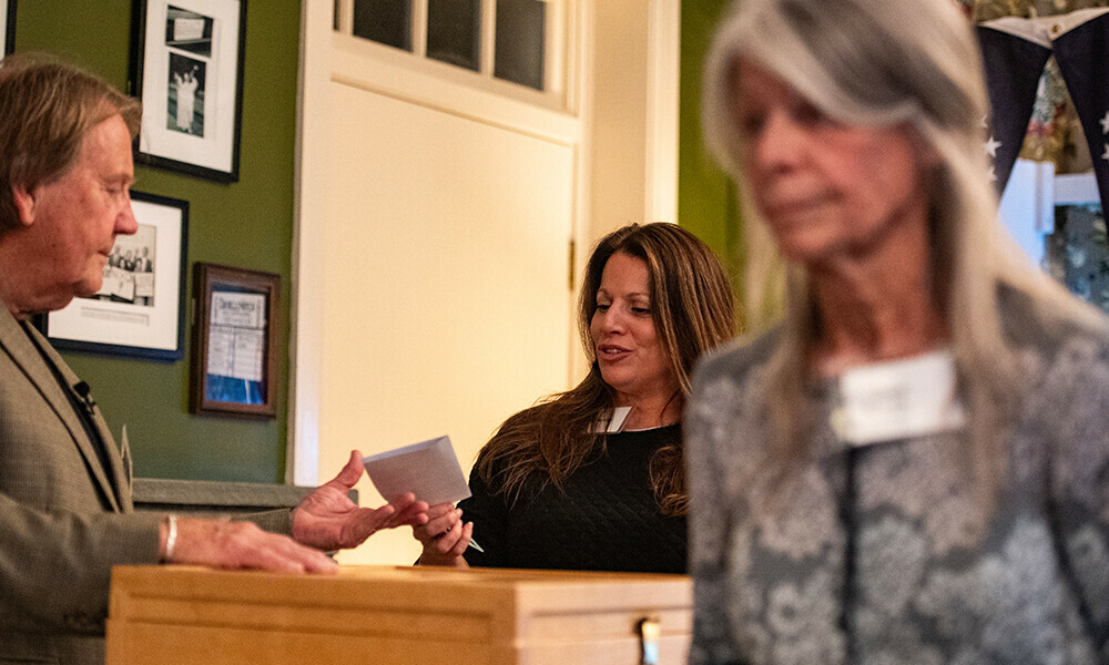 Residents of Dixville Notch cast their ballots in the US election at midnight in the living room of the Tillotson House at the Balsams Grand Resort, marking the first votes in the US election, in Dixville Notch, New Hampshire on November 5, 2024. Photo: AFP