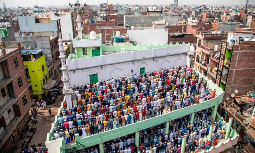 Muslims offer Friday prayers at a mosque in Mustafabad, Delhi, two days after last year’s riots.