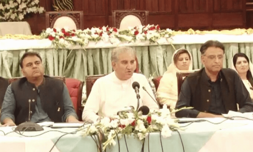  PTI leaders Shah Mahmood Qureshi, Asad Umar and Fawad Chaudhry hold a press conference in Lahore. — DawnNewsTV