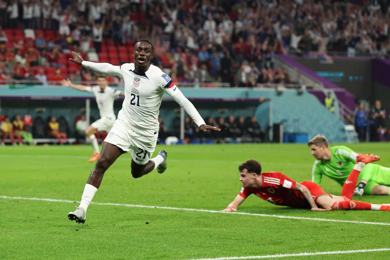 US forward Timothy Weah celebrates after scoring a first-half goal against Wales on Monday, November 21. The match ended 1-1.