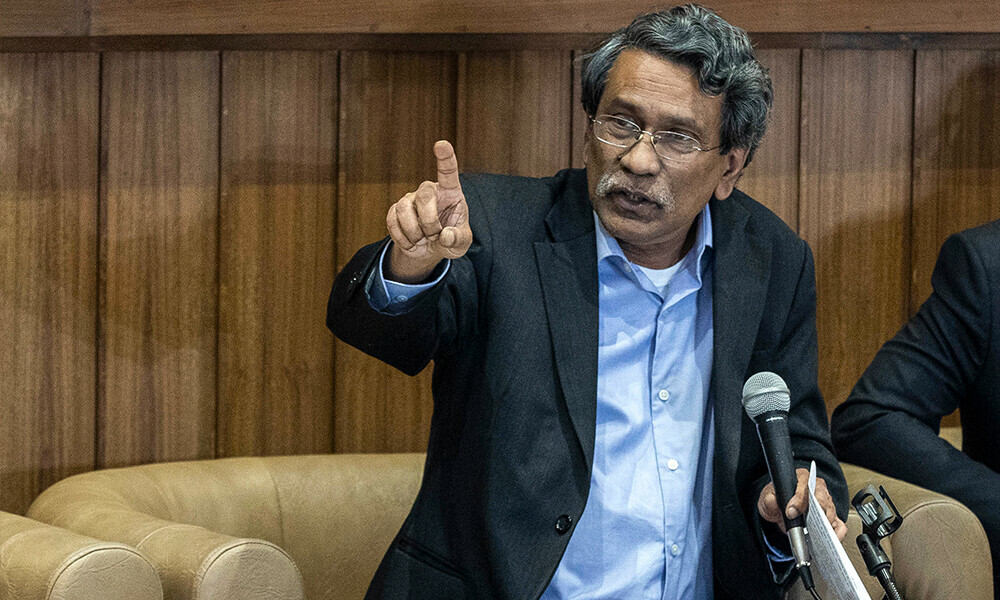 Ali Riaz, head of the Bangladesh’s Constitutional Reform Commission, speaks during a press conference in Dhaka on November 3, 2024. Photo: AFP