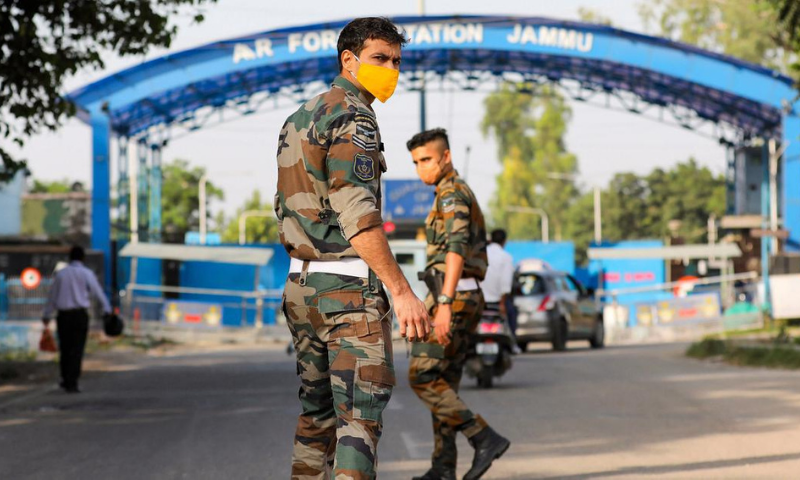 Indian security personnel patrol after two low-intensity explosions took place in the technical area of Jammu Air Force Station in occupied Jammu and Kashmir on Sunday. — Photo via Scroll.in