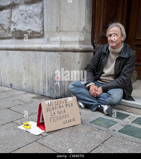 homeless-man-on-street-begging-genoa-italy-cw4ktn.jpg