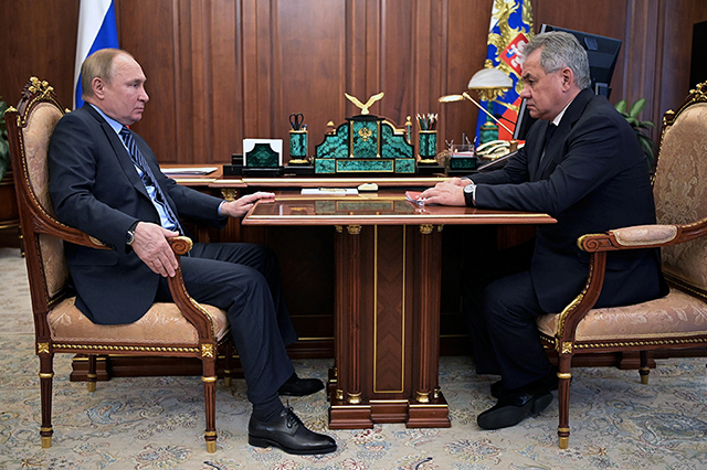 Russia's President Vladimir Putin and Defense Minister Sergei Shoigu