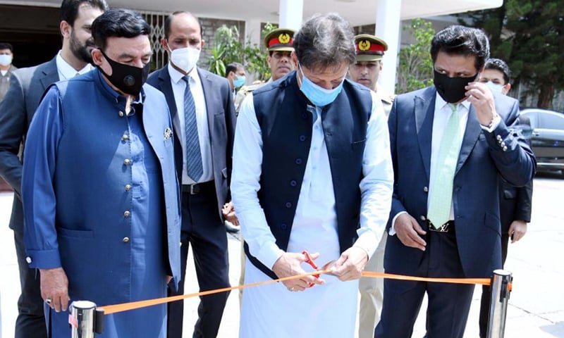 Prime Minister Imran Khan inaugurates Alien Registration Card, mobile vaccination pass and other projects at NADRA headquarters on Friday. — Photo courtesy PID website