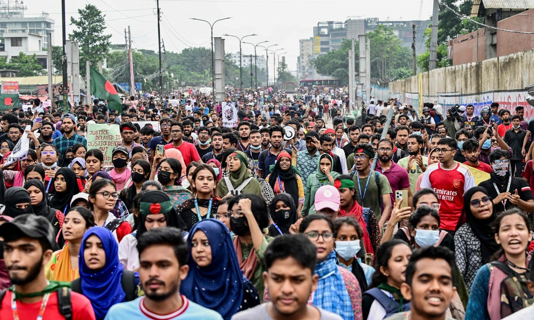  Students shout slogans during a protest march as they demand justice for victims arrested and killed in the recent nationwide violence over job quotas, in Dhaka on Aug 3, 2024. — AFP 