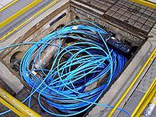 220px-Fibre-optic_cable_in_a_Telstra_pit.jpg