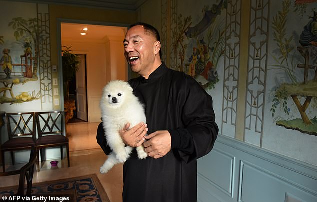 Billionaire Guo Wengui poses at his New York City apartment on November 28, 2017