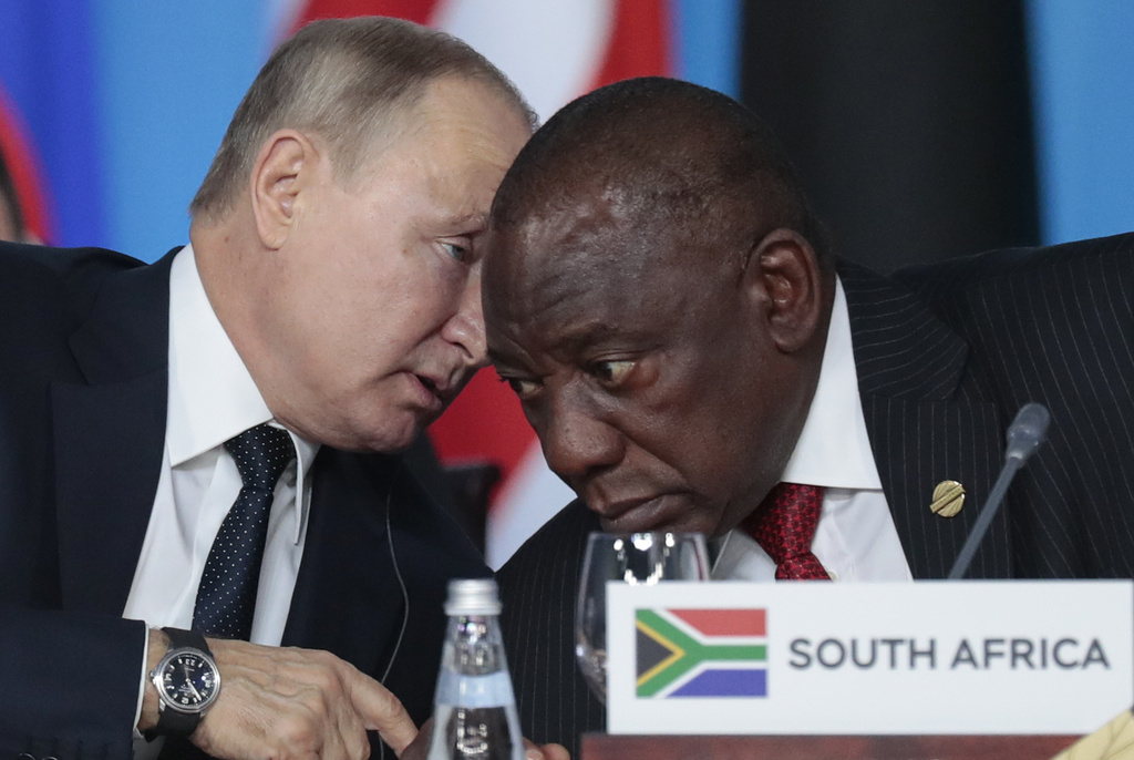 Russian President Vladimir Putin speaks to South African President Cyril Ramaphosa at the Russia-Africa summit in Sochi, Oct. 24, 2019. (Sergei Chirikov—AP)