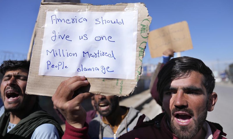 Afghan protesters hold placards and shout slogans against US during a protest condemning President Joe Biden's decision, in Kabul, Afghanistan. — AP