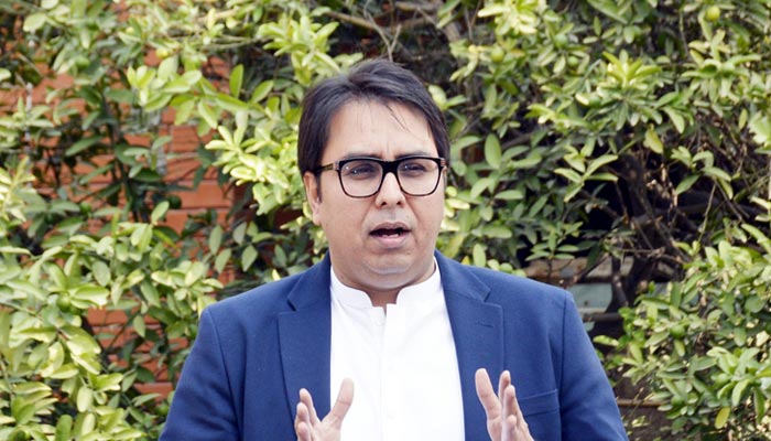 PTI leader Dr Shahbaz Gill addressing a press conference in Lahore, on October 30, 2020. — PID