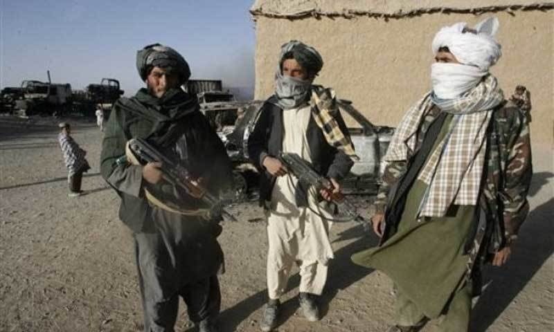 The image shows Afghan Taliban fighters. — AFP/File