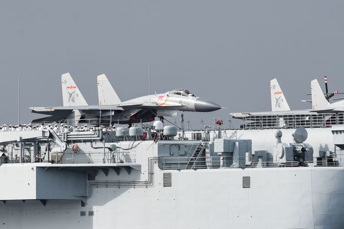 J-15 fighter jets are seen on the flight deck of the Chinese aircraft carrier Liaoning