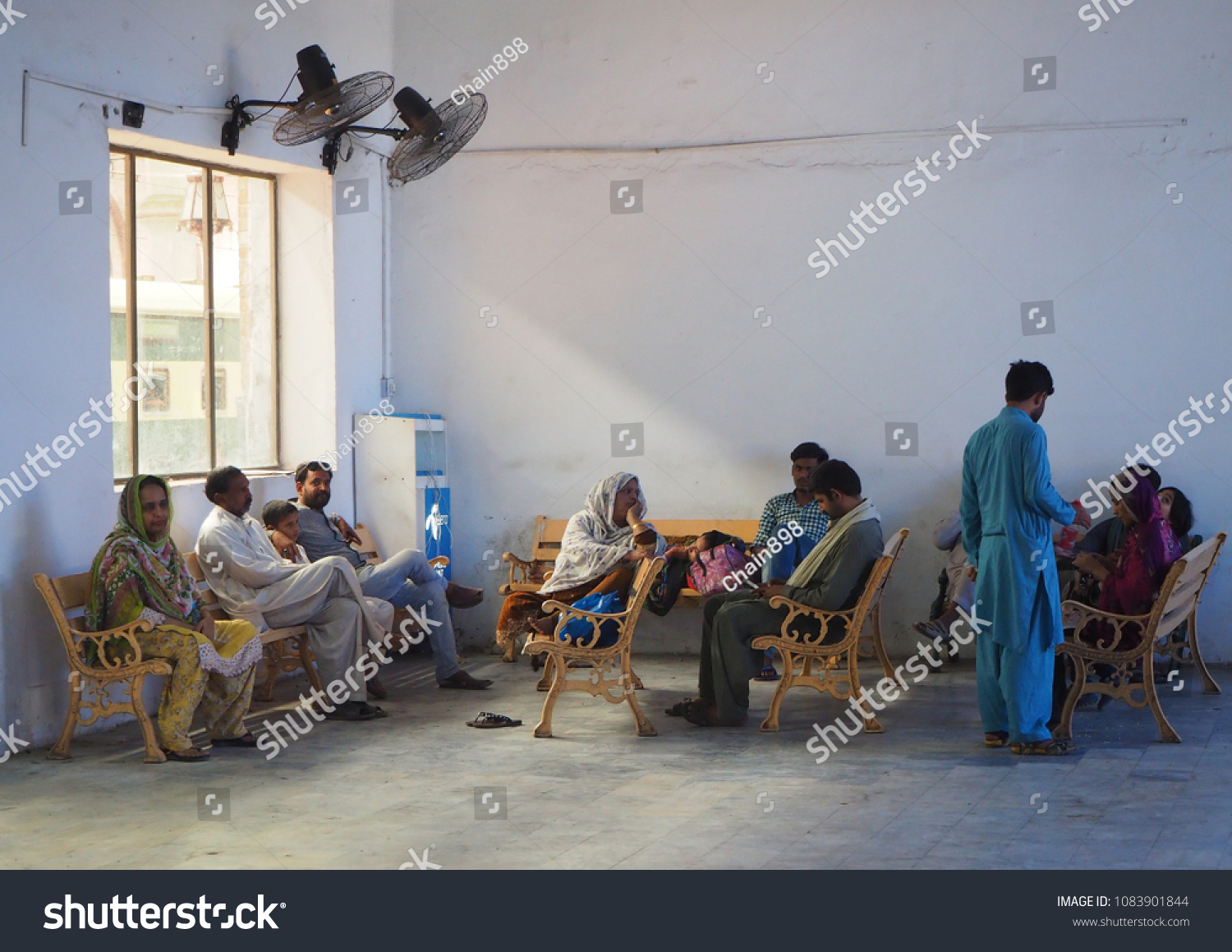stock-photo-lahore-pakistan-may-pakistani-waiting-at-waiting-room-at-lahore-junction-railway-station-1083901844.jpg