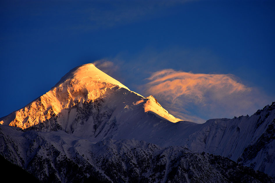 Evening-lights-on-Diran-Peak.jpg