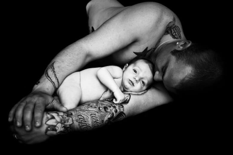 tattooed_man_with_baby-780x521.jpg