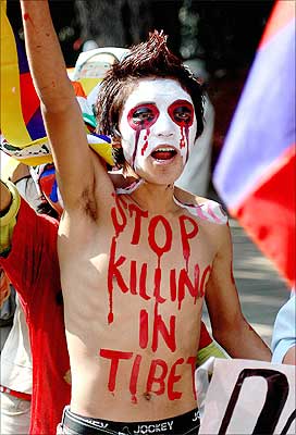 stop-killing-tibetans.jpg