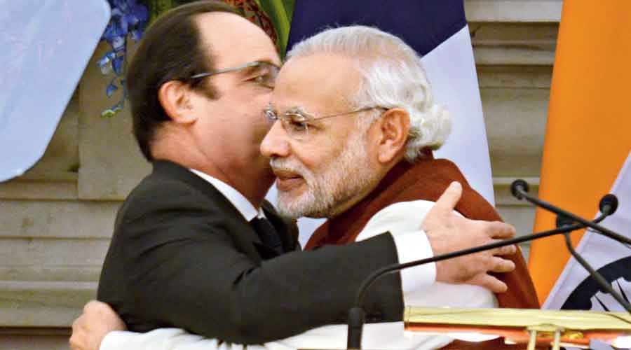 Prime Minister Narendra Modi and then French President Francois Hollande are locked in a hug in Hyderabad House, New Delhi, on January 25, 2016, after it was announced that the two countries had inked a memorandum of understanding on the Rafale fighter aircraft. In September that year, the inter-governmental agreement on 36 Rafale aircraft was signed