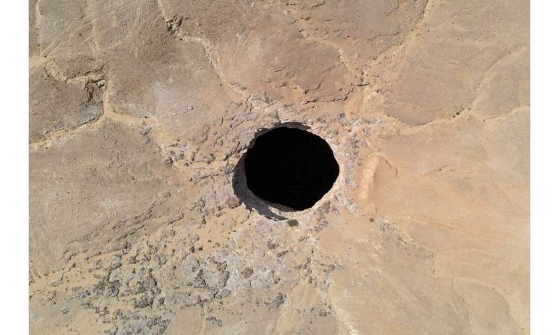 The giant hole in the desert of Al-Mahra province is 30 metres (nearly 100 feet) wide and thought to be anywhere between 100 and