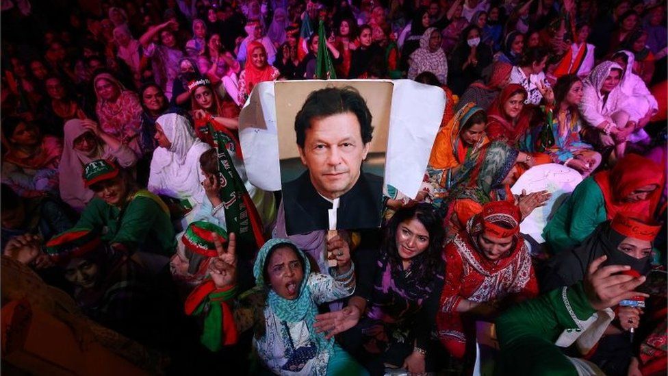 Supporters of opposition party Pakistan Tehrik-e-Insaf listen to former Prime Minister and partys head Imran Khan, during a protest in Karachi, Pakistan, 19 June 2022.
