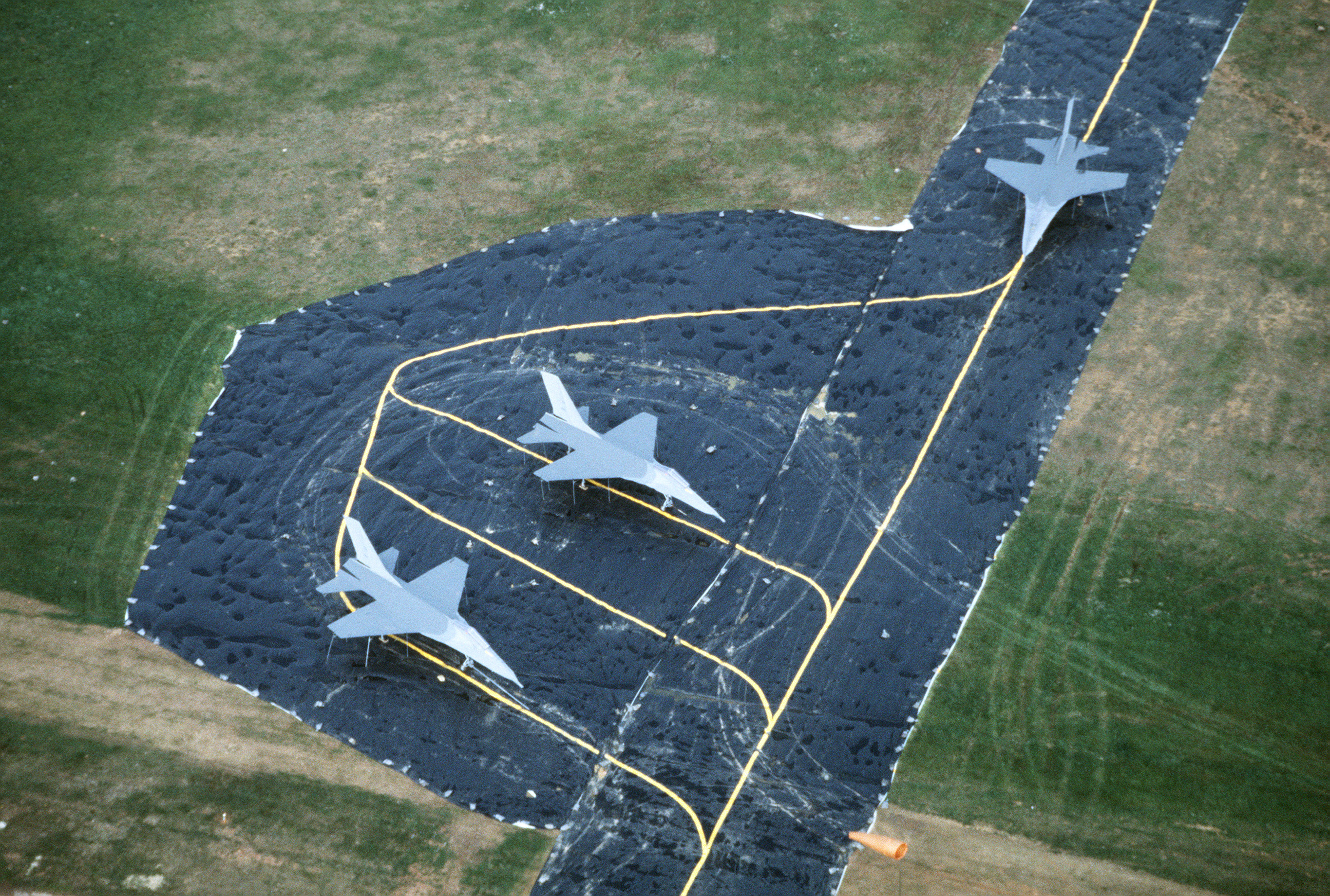 F-16_mockups_on_fake_runway_Spangdahlem_AB_1985.JPEG