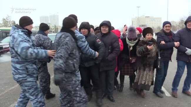 Protesters Dragged Away By Kazakh Police After Activist's Death's Death