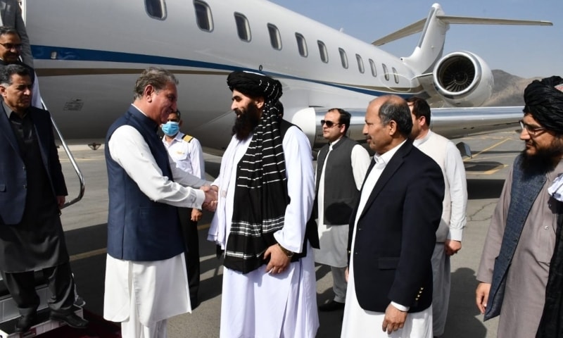 Foreign Minister Shah Mahmood Qureshi is greeted by an Afghan delegation upon his arrival in Kabul. — Photo courtesy Pakistan embassy in Kabul