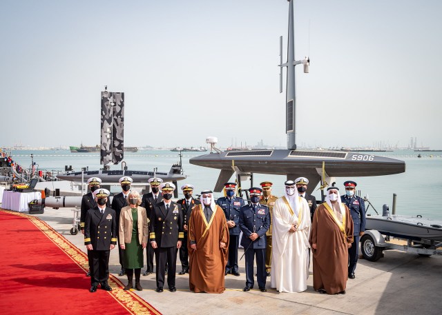 His Royal Highness Prince Salman bin Hamad Al-Khalifa, Crown Prince, Deputy Supreme Commander, and Prime Minister of Bahrain, center, receives a briefing at Naval Support Activity in Bahrain, January 31, 2022