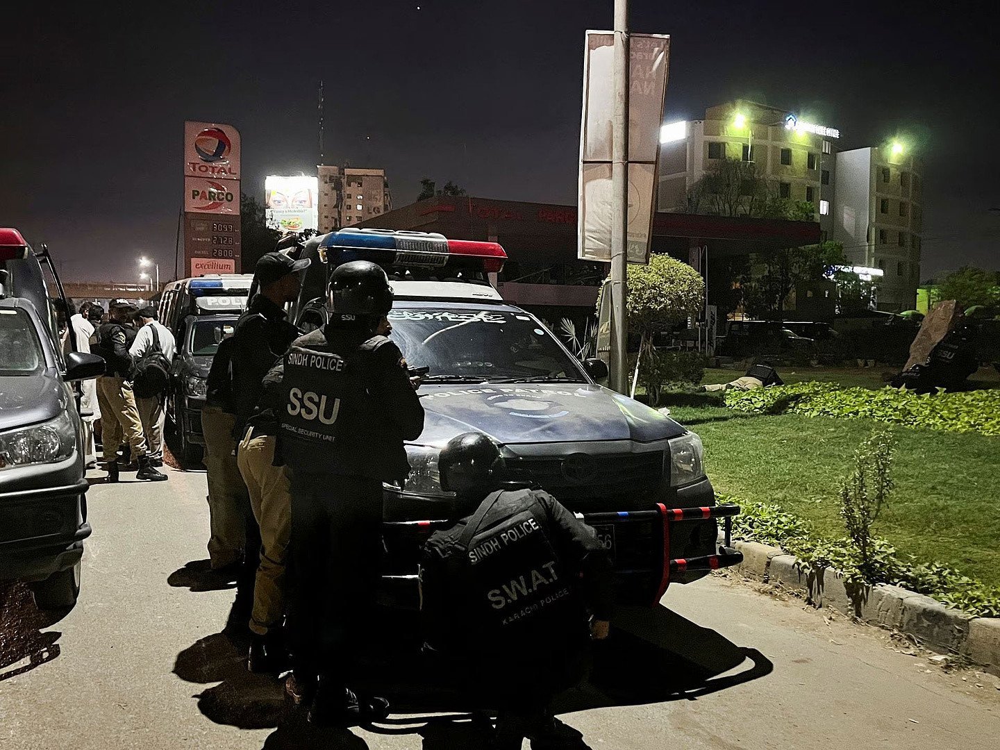 police officers take position after a police office building was attacked by terrorists in karachi on february 17 2023 photo reuters