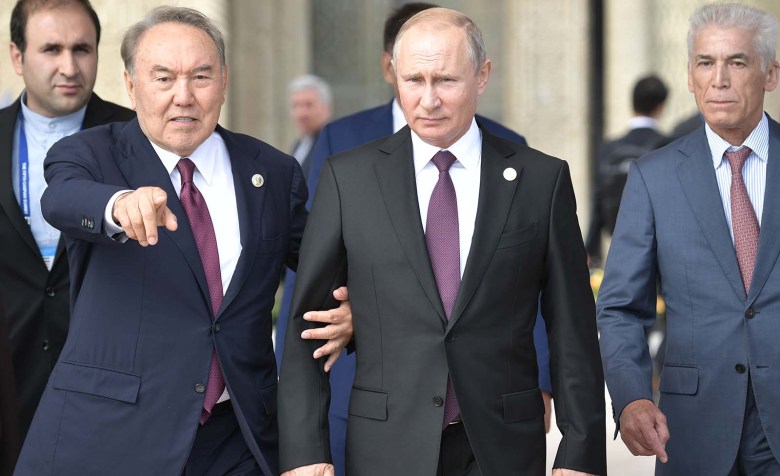 Russian President Vladimir Putin and Kazakhstan President Nursultan Nazarbayev walk along a  Caspian Sea embankment while participating in the Fifth Caspian Summit in Aktau, Kazakhstan. Photo: Sputnik/Aleksey Nikolskyi