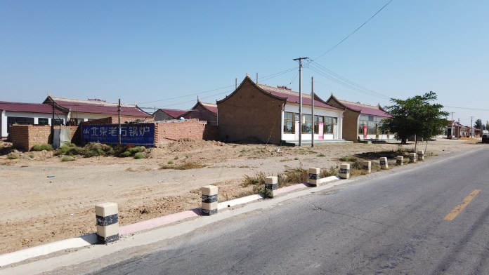 Much of rural Gansu now looks more like this, there is still evidence of the old dwellings
