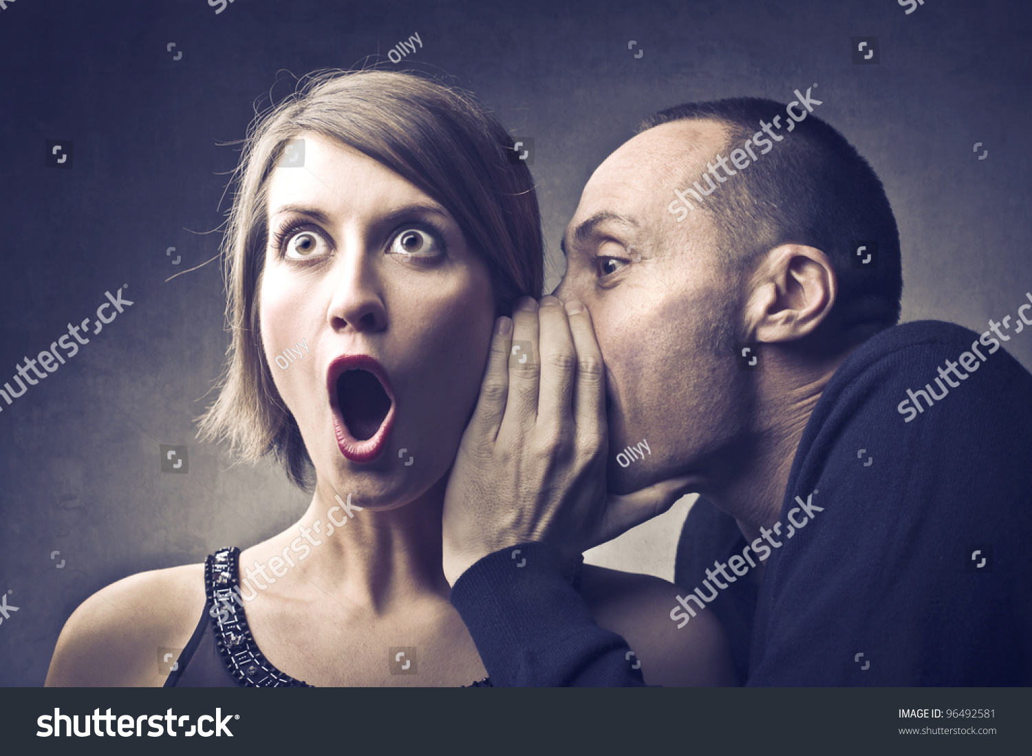 stock-photo-man-telling-an-astonished-woman-some-secrets-96492581.jpg