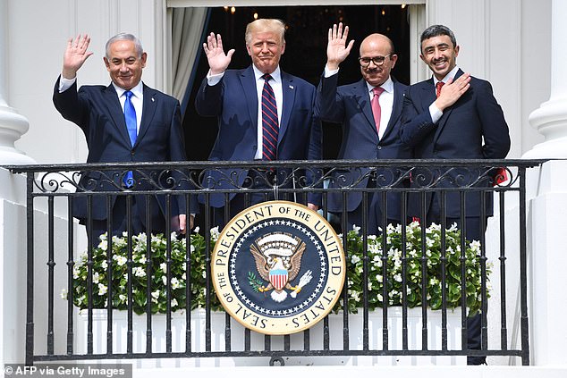 It comes after Bahrain, the UAE and Sudan normalised relations with Israel, in negotiations overseen by the Trump administration (pictured, Netanyahu, Trump, Bahrain foreign minister and UAE foreign minister at the White House)
