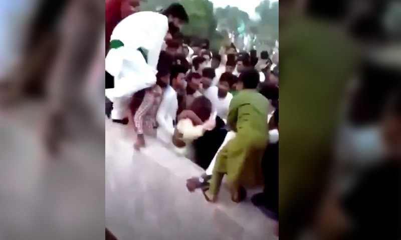 This screengrab shows a female TikToker being assaulted on August 14 when hundreds of youngsters were celebrating Independence Day near Minar-i-Pakistan. — Twitter screengrab/File