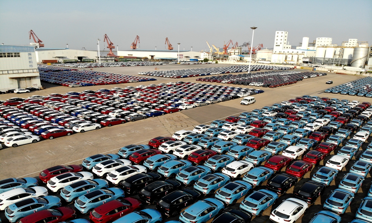 Nearly 5,000 of SAIC's MG-branded vehicles wait to be exported at the port of Lianyungang, East China's Jiangsu Province on Sunday. The vehicles are headed to markets including the UK, Australia and Belgium. The port's auto export business has grown rapidly this year. Photo: cnsphoto's MG-branded vehicles wait to be exported at the port of Lianyungang, East China's Jiangsu Province on Sunday. The vehicles are headed to markets including the UK, Australia and Belgium. The port's auto export business has grown rapidly this year. Photo: cnsphoto