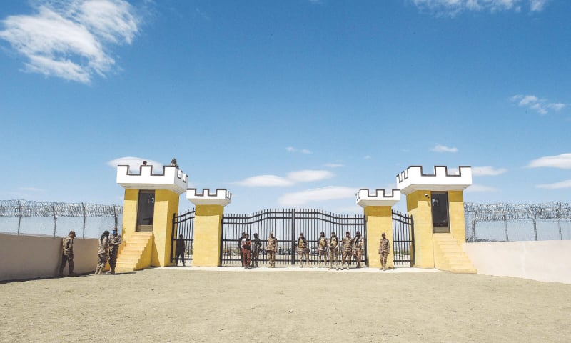 FC men patrol near the gateway. Pakistan has formalised the entry and exit points at Badini gateway by installing a proper gate. From now on vehicles and people from both sides of the border will be allowed to use this crossing point only as a fence has been erected on large parts along the border. This is part of the government’s effort to fence most portions of the long border between the two countries, leaving only a few dedicated entry and exit points. The move is aimed at discouraging the free movement of armed militants. — AFP