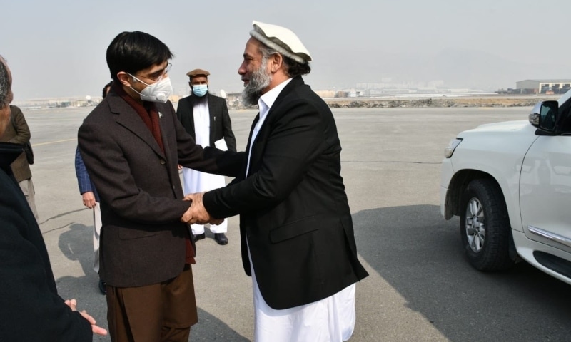 National Security Adviser Moeed Yusuf is received by an Afghan official at Hamid Karzai International Airport, Kabul, Afghanistan. — Mansoor Ahmad Khan Twitter