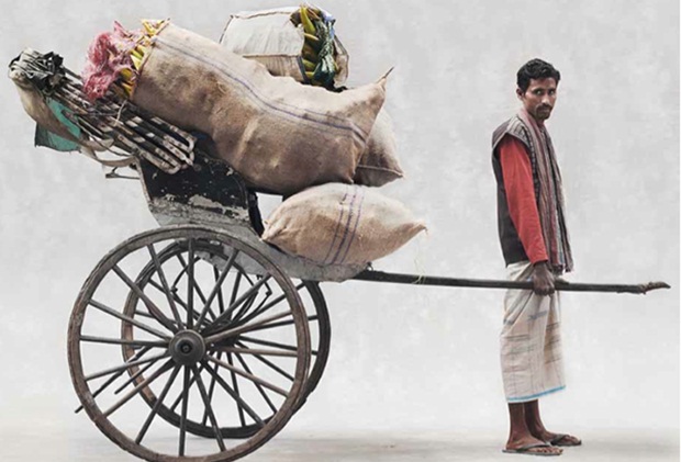 hand-pulled-rickshaws-carrying-goods-in-marketplace.jpg