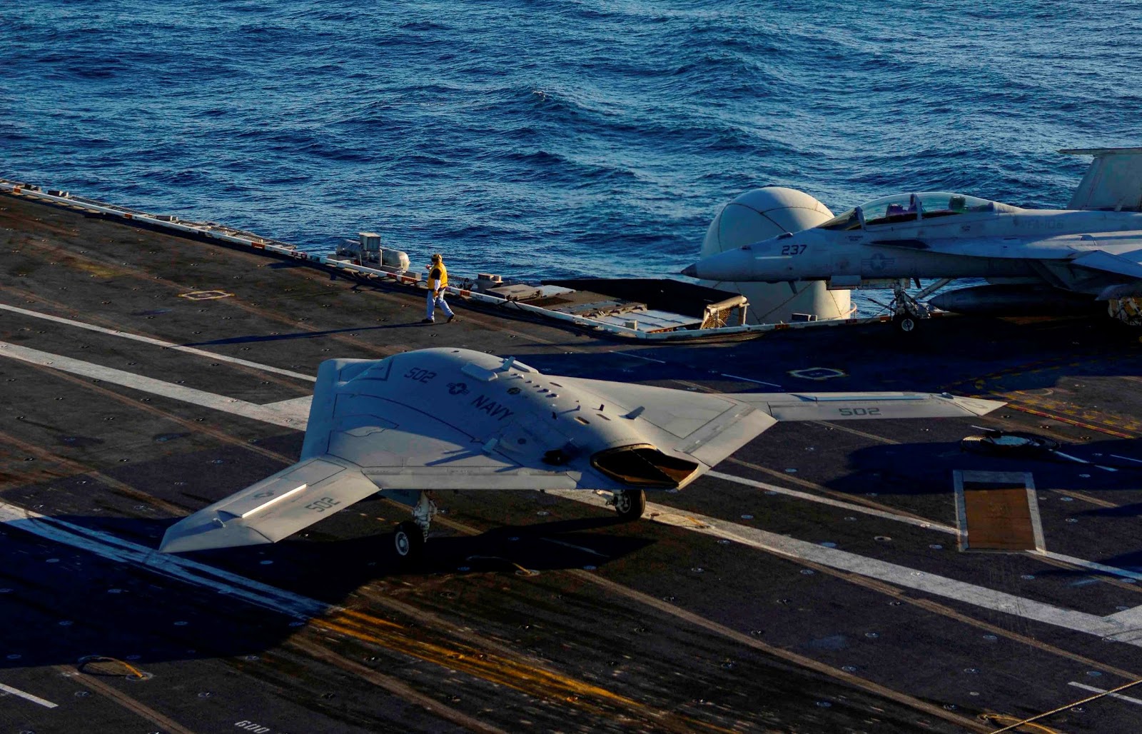 Northrop+Grumman+X-47B+Unmanned+Combat+Air+System+(UCAS)+demonstrator+taxies+on+the+flight+deck+of+the+aircraft+carrier+USS+Harry+S.+Truman+(CVN+75).+Harry+S.+Truman+aircraft+carrier+host+test+operations+for+an+unmanned+airc+(4).jpg