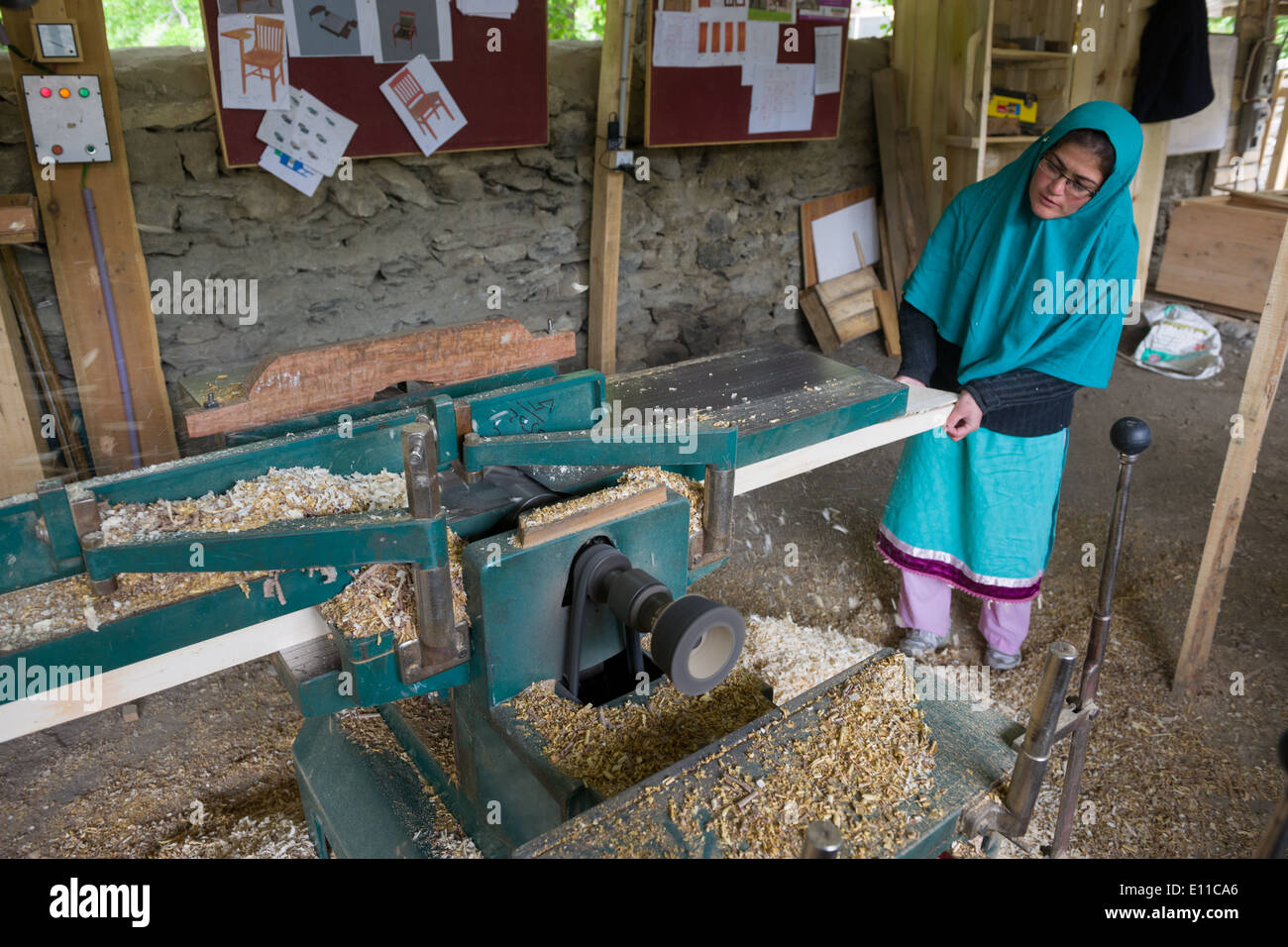 woman-using-a-power-tool-at-a-charity-teaching-pakistani-women-carpentry-E11CA6.jpg