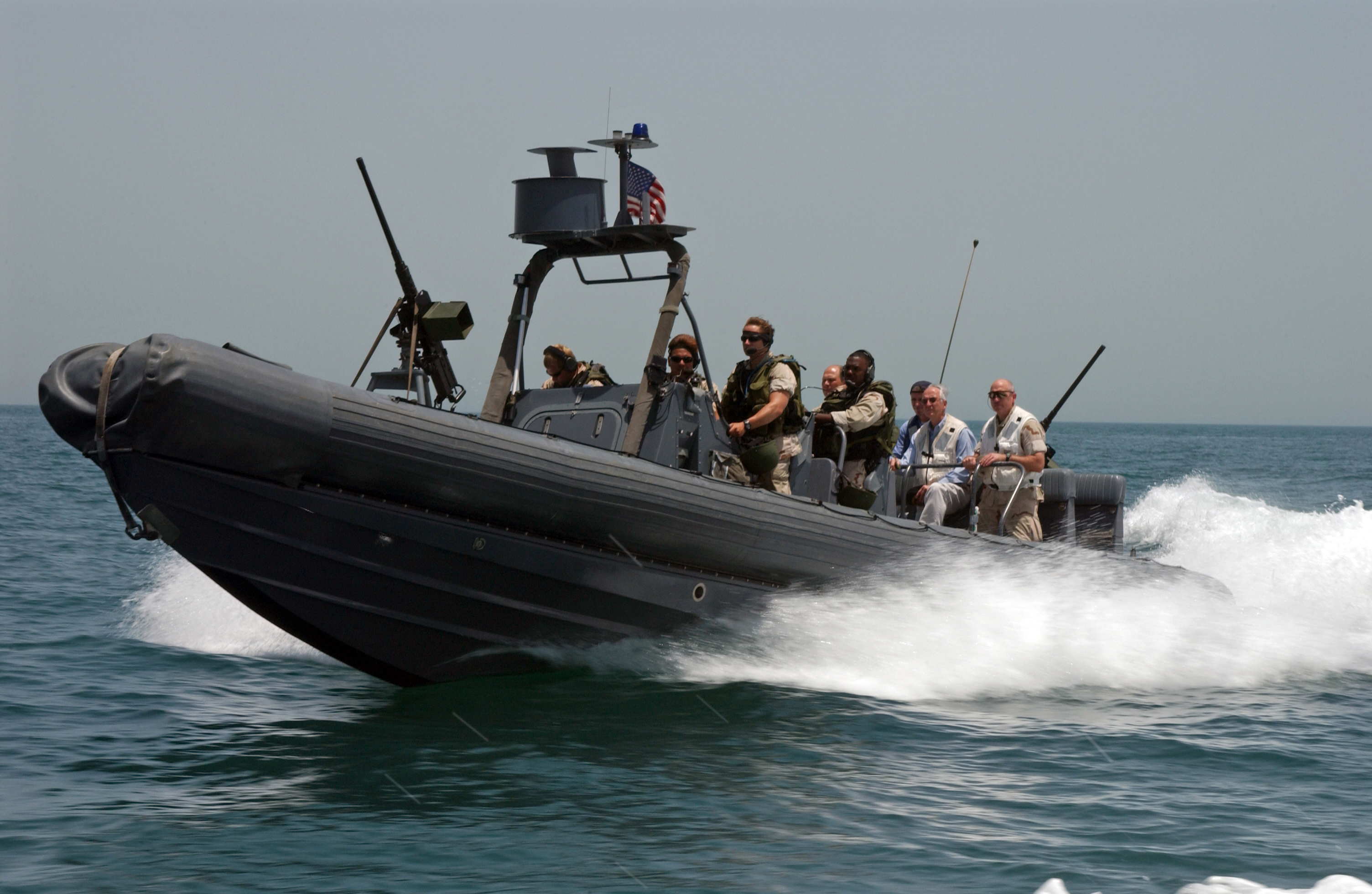 US_Navy_040520-N-7586B-057_Riding_in_a_Rigid_Hull_Inflateable_Boat_(RHIB),_Secretary_of_the_Navy,_Gordon_R._England,_is_transported_from_the_Al_Basrah_Oil_Terminal_(ABOT)_to_the_coastal_patrol_ship_USS_Chinook_(PC_9).jpg