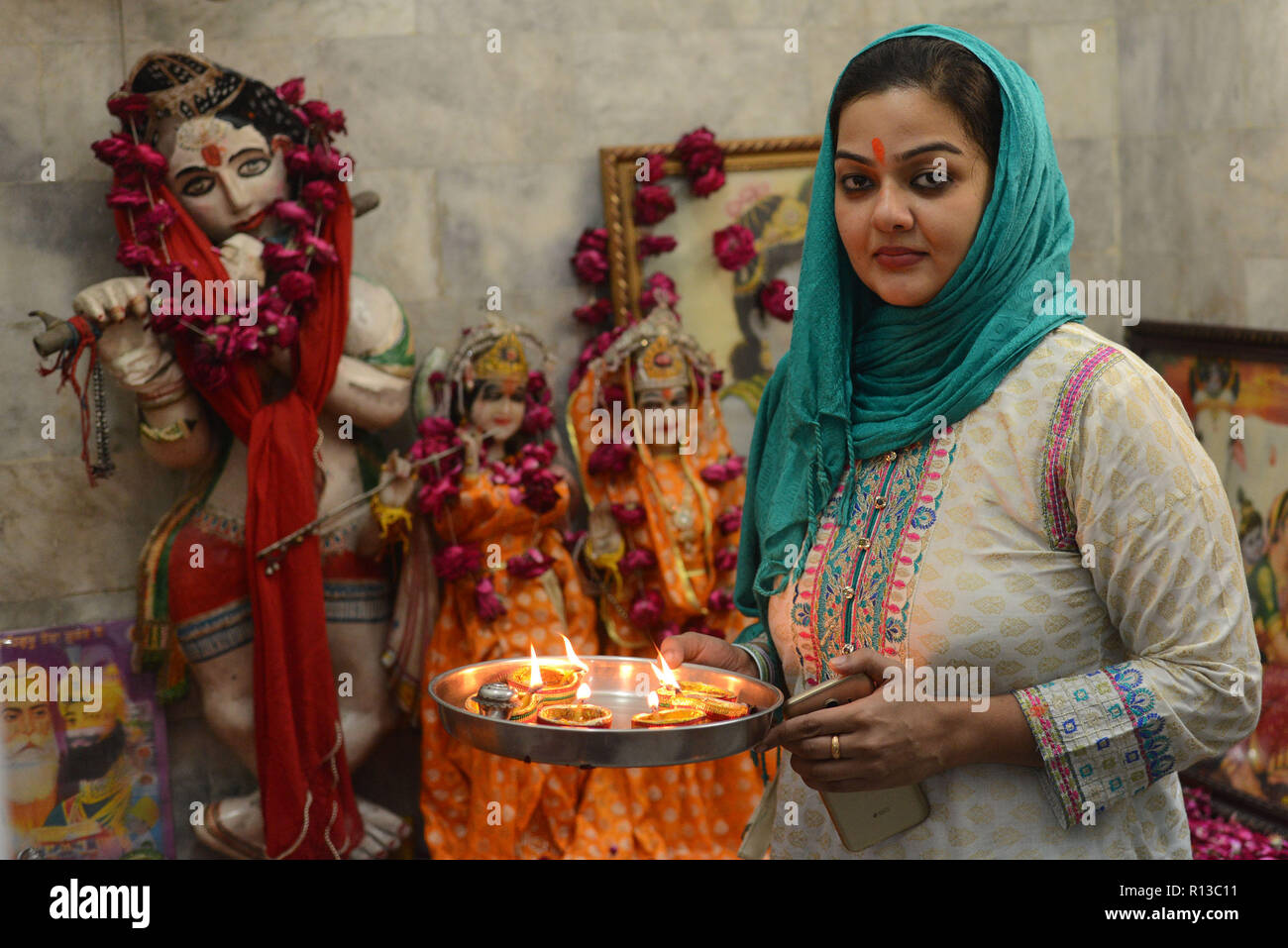 lahore-pakistan-07th-nov-2018-pakistani-hindu-community-performing-religious-festival-during-diwali-celebration-at-shri-krishna-mandir-credit-rana-sajid-hussainpacific-pressalamy-live-news-R13C11.jpg