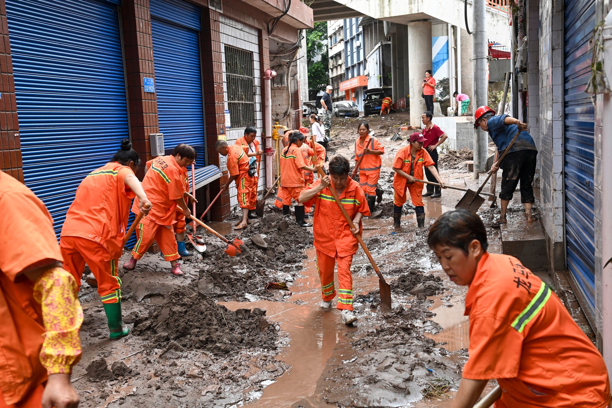 Clean-up operations get underway in the city’s Wanzhou district. Photo: AP