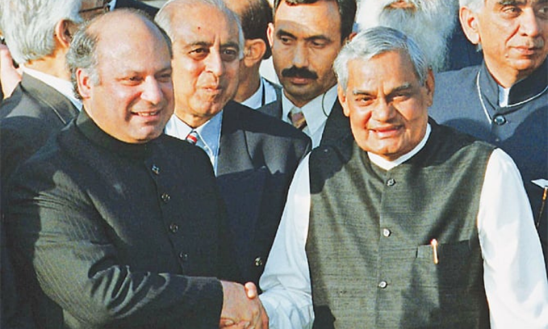 In this photo taken on Feb 20, 1999, then prime minister Nawaz Sharif receives then Indian prime minister Atal Bihari Vajpayee at the Wagah border near Lahore. — AP/File