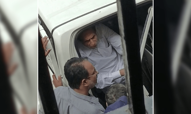 PTI President Chaudhry Parvez Elahi photographed inside a vehicle while being taken away from a Lahore anti-corruption court on Sunday. — DawnNewsTV