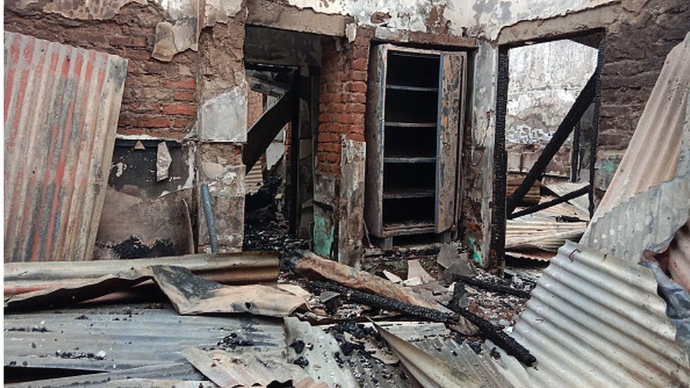 Charred remains of official residence of Manipur's Minister Nemcha Kipgen in Imphal, which was set ablaze by mob last evening during ongoing ethnic violence in India's north-eastern Manipur state on June 15, 2023